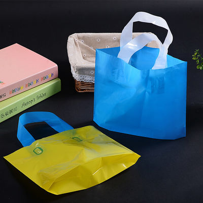 Bolsos de compras plásticos personalizados para la tienda de la ropa
