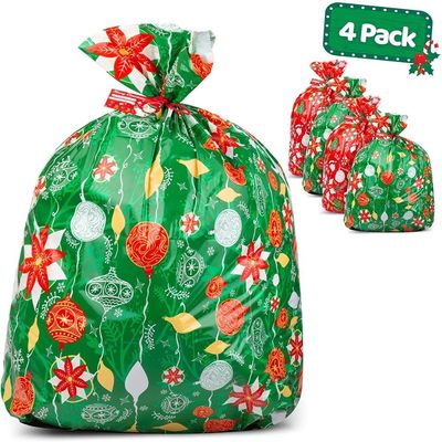 Cree los bolsos plásticos coloridos del papel de regalo para requisitos particulares para el embalaje enorme del presente de Navidad